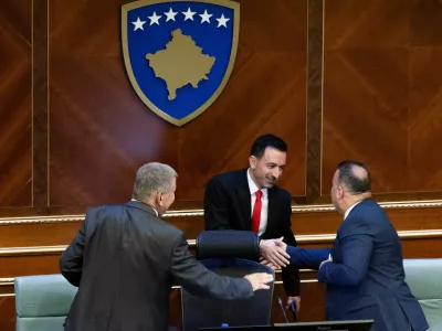 Attendees greet Dimal Basha, the newly elected speaker of Kosovo's parliament, following his election in Pristina, Kosovo August 26, 2025. REUTERS/Valdrin Xhemaj