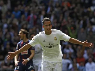 FILE - Real Madrid's Lucas Vazquez celebrates after scoring his side's second goal against Eibar during the Spanish La Liga soccer match between Real Madrid and Eibar at the Santiago Bernabeu stadium in Madrid, Saturday, April 9, 2016. (AP Photo/Francisco Seco, File)