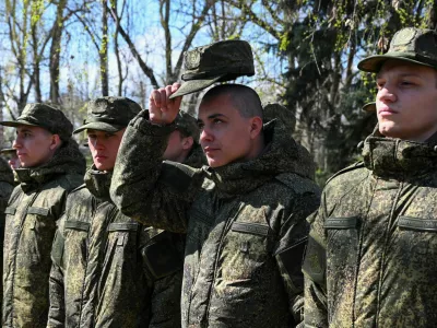 Russian conscripts called up for military service line up during a ceremony before their departure for garrisons, in Bataysk in the Rostov region, Russia, April 10, 2025. REUTERS/Sergey Pivovarov
