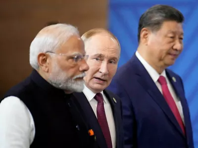 FILE PHOTO: Indian Prime Minister Narendra Modi, Russian President Vladimir Putin and Chinese President Xi Jinping attend a family photo ceremony prior to the BRICS Summit plenary session in Kazan, Russia, Wednesday, Oct. 23, 2024.   Alexander Zemlianichenko/Pool via REUTERS/File Photo