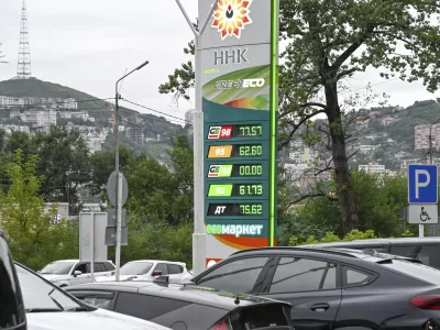 Cars are parked at a gas station in Vladivostok, Russia, on Aug. 25, 2025. (AP Photo)