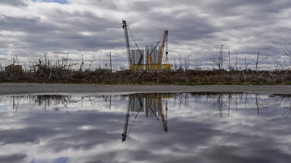 FILE - Wind turbine components sit at New London State Pier, April 16, 2025, in New London, Conn. (AP Photo/Julia Demaree Nikhinson, File)