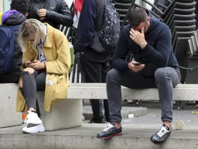 People use mobile phone (smartphone) in Prague, Czech Republic, September 23, 2019. Addiction to social networking, dating apps, texting, and messaging - nomophobia (irrational fear of being without mobile phone). Photo/Milos Ruml (CTK via AP Images)