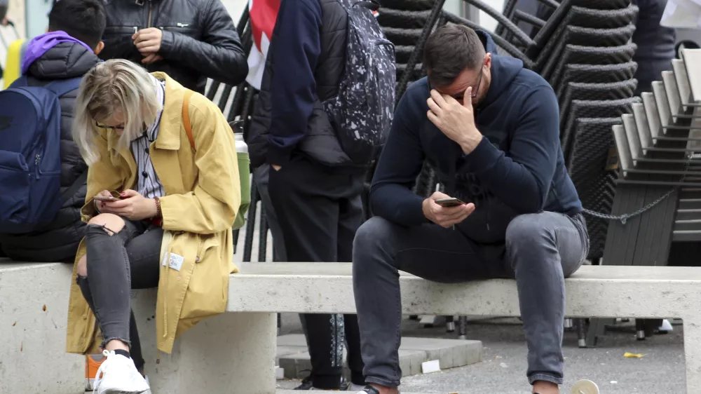 People use mobile phone (smartphone) in Prague, Czech Republic, September 23, 2019. Addiction to social networking, dating apps, texting, and messaging - nomophobia (irrational fear of being without mobile phone). Photo/Milos Ruml (CTK via AP Images)
