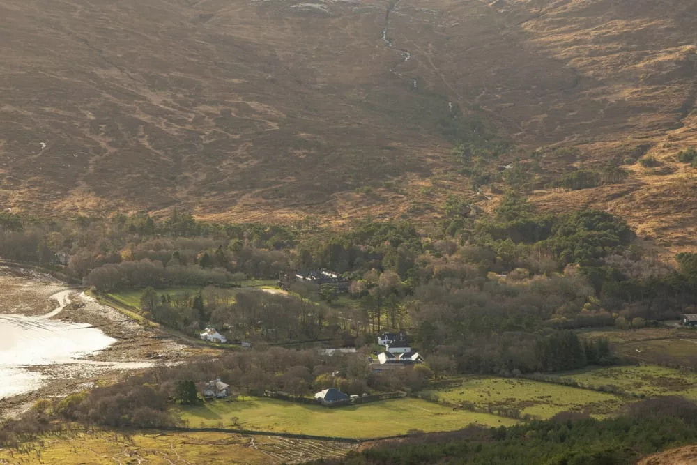 Kinloch Castle. See SWNS story SWOCcastle. July 29, 2021.One of Prince Charles' favourite castles is looking for a new owner to save it from ruin as the iconic landmark crumbles in need of repair. Kinloch Castle on the Island of Rum in Scotland is on the market for a new owner who could put the money required into fixing up the crumbling castle. With a nominal value of just &pound;1, this is an extremely rare opportunity to take ownership of a 120-year-old castle that Prince Charles himself has been passionate about saving. Repairs on the crumbling turreted red-sandstone house are estimated at an eye-watering &pound;20 million to restore the castle to it's former glory. A private individual or a charity, foundation or private company who can provide such an amount for the castle repairs are in with a chance of owning the incredible house. Any new hopeful owners will have to prove that they have the resources to save this Category A landmark and show plans for bettering the future of the small isle where the castle sits.,Image: 624152993, License: Rights-managed, Restrictions: This image is not available for use at a stock rate unless with prior agreement. This image hereby disclosed to your organisation is so disclosed on the condition that your organisation will take all steps necessary to ensure that any identifiable personal data is processed in full compliance with the Data Protection Act 2018follow us on twitter - @swnsbrowse our website - swns.comemail pix@swns.com, Model Release: no