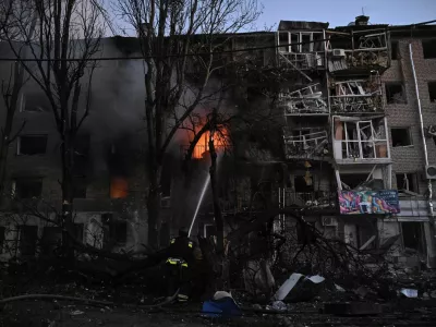 A firefighter works at the site of an apartment building hit during a Russian drone and missile strike, amid Russia's attack on Ukraine, in Zaporizhzhia, Ukraine August 30, 2025. REUTERS/Stringer