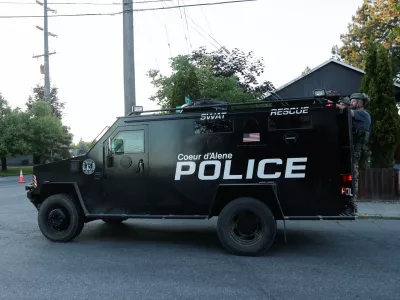 An armored police vehicle leaves an area where multiple firefighters were attacked when responding to a fire in the Canfield Mountain area outside Coeur d'Alene, Idaho, U.S. June 29, 2025. REUTERS/Young Kwak