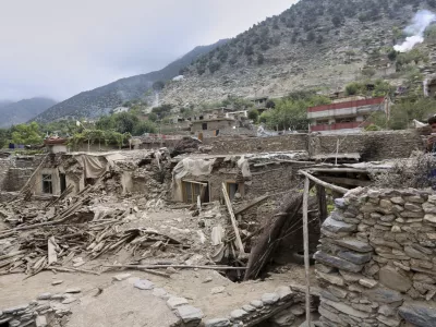 Collapsed houses are seen in an area devastated by Sunday's powerful 6.0-magnitude earthquake that killed many people and destroyed villages in eastern Afghanistan, in Dara Noor, Kunar province, Tuesday, Sept. 2, 2025,. (AP Photo/Wahidullah Kakar)
