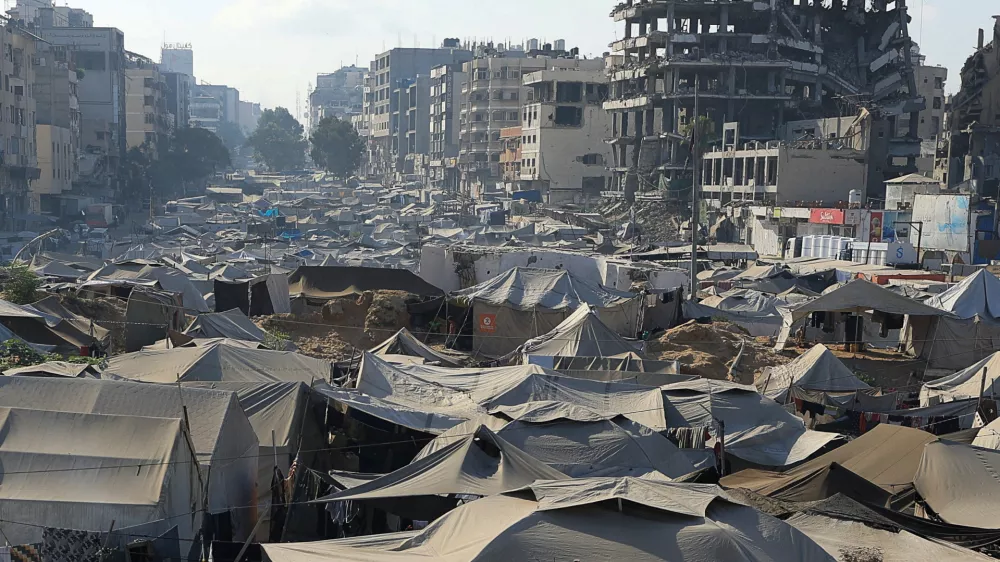 Palestinians displaced by the Israeli military offensive take shelter in a tent camp, as Israeli forces escalate operations around Gaza City, in Gaza City, September 2, 2025. REUTERS/Dawoud Abu Alkas