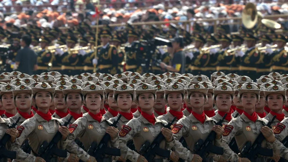 Chinese militia members march during a military parade to mark the 80th anniversary of the end of World War Two, in Beijing, China, September 3, 2025. REUTERS/Maxim Shemetov   TPX IMAGES OF THE DAY