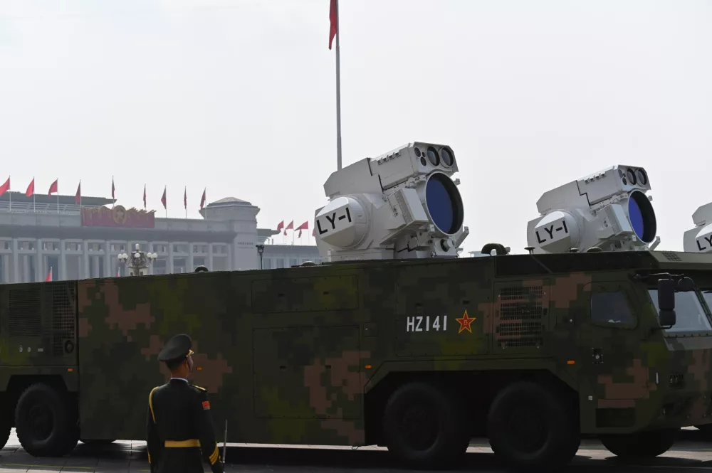 03 September 2025, China, Beijing: Vehicles equipped with the LY-1 laser weapon drive past Tiananmen Square during the military parade marking the 80th anniversary of the victory over militarist Japan and the end of World War II. Photo: Johannes Neudecker/dpa