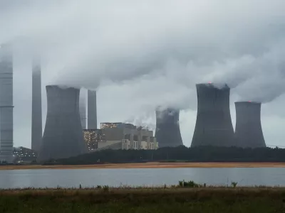 FILE - This June 1, 2014, file photo show the coal-fired Plant Scherer in operation in Juliette, Ga. Despite what President Donald Trump says, scientists have long known that what's warming the planet isn't natural. It's us. Climate scientists say Trump was wrong. There are several ways they know that more than 90 percent of climate change is caused by emissions of heat-trapping gases from activities like burning coal and natural gas for electricity, or burning gasoline, diesel and jet fuel for transportation. In other words, humans. (AP Photo/John Amis, File)