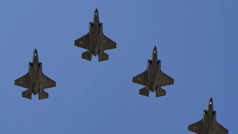 A squadron U.S. Air Force F-35 Lightning II aircraft flyover as President Donald Trump greets Polish President Karol Nawrocki at the White House, Wednesday, Sept. 3, 2025, in Washington. (AP Photo/Alex Brandon)