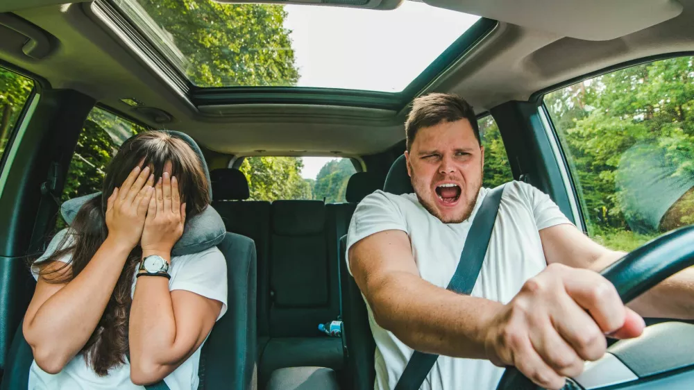 couple all most get car accident. not safe driving. insurance concept