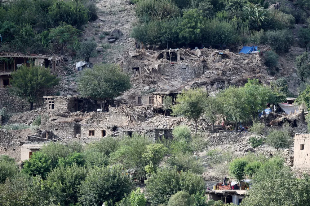 Houses damaged by a deadly earthquake that struck Afghanistan's Kunar and Nangarhar provinces, at Masud village in Nurgal district, Kunar province, Afghanistan, September 4, 2025. REUTERS/Sayed Hassib