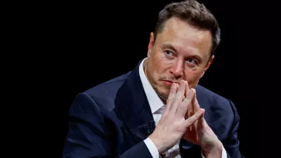FILE PHOTO: FILE PHOTO: Elon Musk, Chief Executive Officer of SpaceX and Tesla and owner of Twitter, gestures as he attends the Viva Technology conference dedicated to innovation and startups at the Porte de Versailles exhibition centre in Paris, France, June 16, 2023. REUTERS/Gonzalo Fuentes/File Photo/File Photo