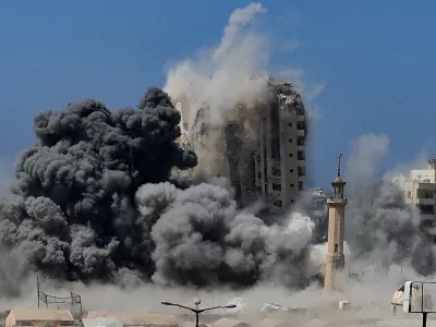 Smoke rises as a building is hit by an Israeli strike, in Gaza City, September 5, 2025. REUTERS/Dawoud Abu Alkas