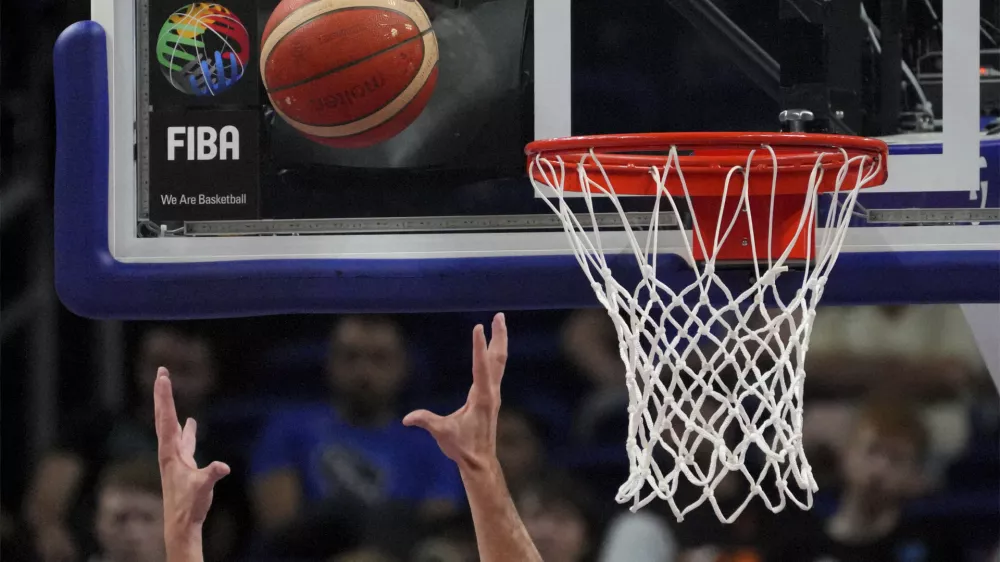 Belgium's Maxime De Zeeuw catches the ball during the Eurobasket round of sixteen basketball match between Slovenia and Belgium in Berlin, Germany, Saturday, Sept. 10, 2022. (AP Photo/Michael Sohn)
