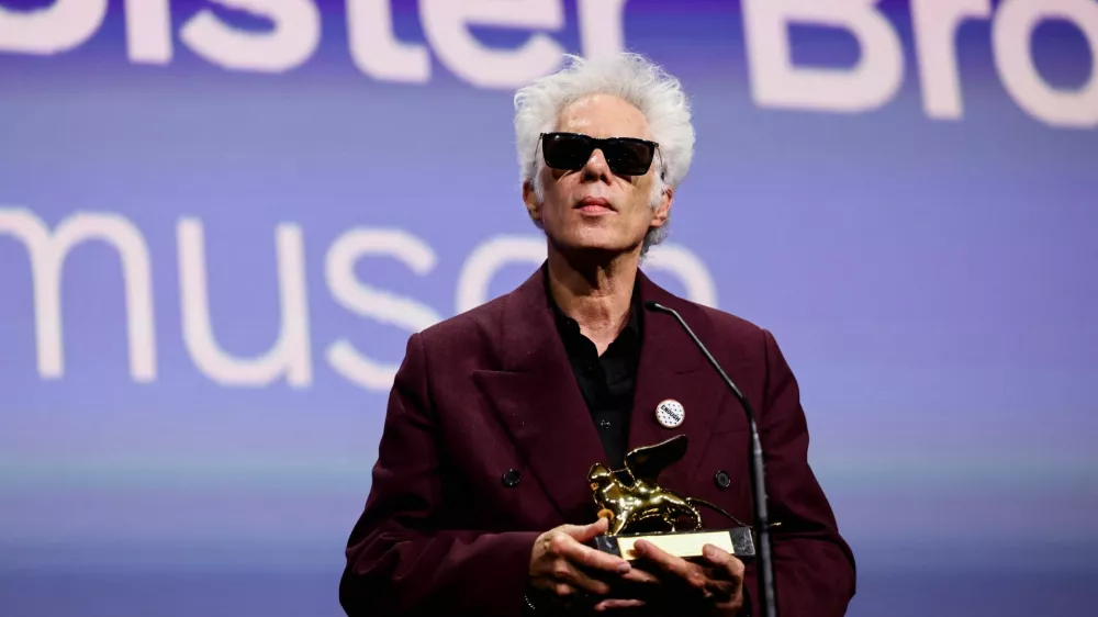Jim Jarmusch receives the Golden Lion for Best Film for "Father Mother Sister Brother" during the closing ceremony of the 82nd Venice International Film Festival, in Venice, Italy, September 6, 2025. REUTERS/Yara Nardi