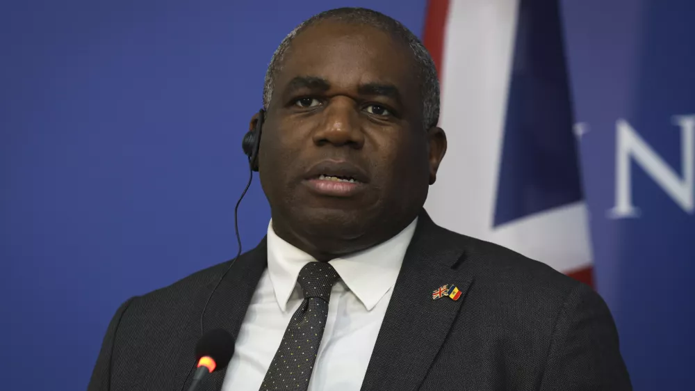 Britain's Foreign Secretary David Lammy speaks during a joint press conference with Moldova's Foreign Minister Mihai Popsoi and Romanian Foreign Minister Luminita Odobescu, in Chisinau, Moldova, Wednesday, Nov. 20, 2024. (AP Photo/Aurel Obreja)