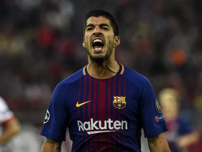 FILED - 01 November 2017, Greece, Athens: Barcelona's Luis Suarez reacts during the UEFA Champions League Group D soccer match between Olympiacos and FC Barcelona at the Karaiskaki stadium in Piraeus. Italian police are investigating possible irregularities in the Italian language exam taken by Uruguayan striker Luis Suarez at the University for Foreigners in Perugia in order to obtain an Italian passport. Photo: Angelos Tzortzinis/dpa