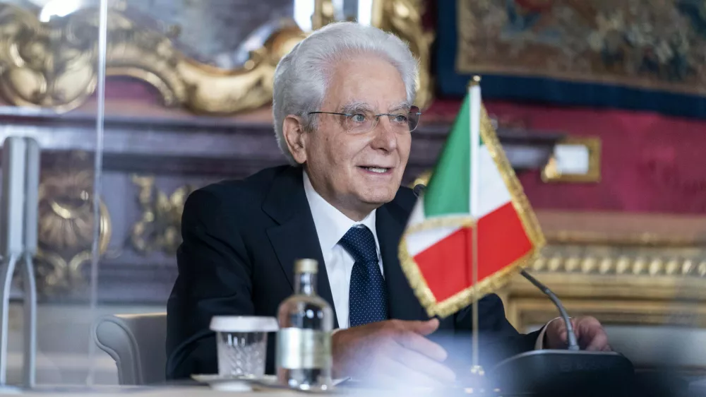 FILE - Italian President Sergio Mattarella speaks during a meeting with Secretary of State Antony Blinken at Quirinale Palace in Rome, Monday, June 28, 2021. Mattarella has been elected to a second seven-year term as the country&acirc;&euro;&trade;s head of state, ending days of political impasse as party leaders struggled to pick his successor. Earlier on Saturday, lawmakers entreated Mattarella, 80, who had said he didn&acirc;&euro;&trade;t want a second mandate, to change his mind and agree to reelection by lawmakers in Parliament and regional delegates. (AP Photo/Andrew Harnik, Pool, File)