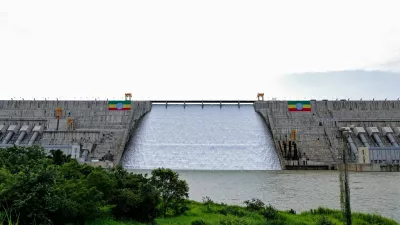 Large Ethiopian flags are displayed on the Grand Ethiopian Renaissance Dam (GERD), built along the Blue Nile, during its inauguration, in Guba, Benishangul-Gumuz region, Ethiopia, September 9, 2025. REUTERS/ Tiksa Negeri