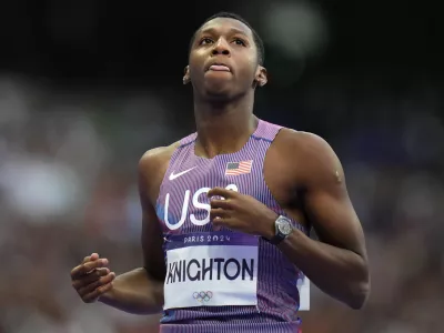 FILE - Erriyon Knighton, of the United States, reacts following his men's 200-meter semifinal at the 2024 Summer Olympics, on Aug. 7, 2024, in Saint-Denis, France. (AP Photo/Petr David Josek, File)