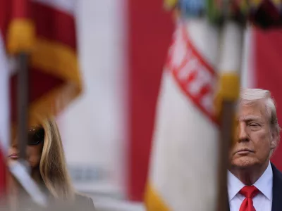 President Donald Trump and first lady Melania Trump attend a ceremony at the Pentagon to commemorate the 24th anniversary of the 9/11 attacks, Thursday, Sept. 11, 2025, in Washington. (AP Photo/Julia Demaree Nikhinson)