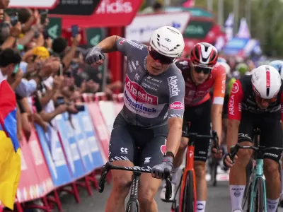 Belgian cyclist Jasper Philipsen wins the nineteenth stage of the Spanish La Vuelta cycling race, from Rueda to Guijuelo, Spain, Friday, Sept. 12, 2025. (AP Photo/Manu Fernandez)