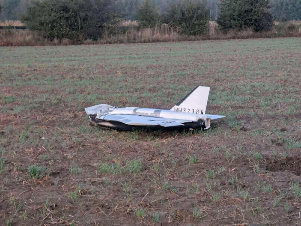 A damaged drone lies after falling in the eastern Polish village of Czosnowka, in this picture obtained from social media, in Czosnowka, Poland, September 10, 2025. Dariusz Stefaniuk/via REUTERS THIS IMAGE HAS BEEN SUPPLIED BY A THIRD PARTY. MANDATORY CREDIT. NO RESALES. NO ARCHIVES. BEST QUALITY AVAILABLE. Verification: Reuters was able to independently verify the location the photos were taken from vegetation and telegraph poles that matched verified media coverage from the area and Street View imagery. Reuters was able to independently verify the date by multiple reports and aftermath footage. Additionally, drone identification number appears in multiple images.