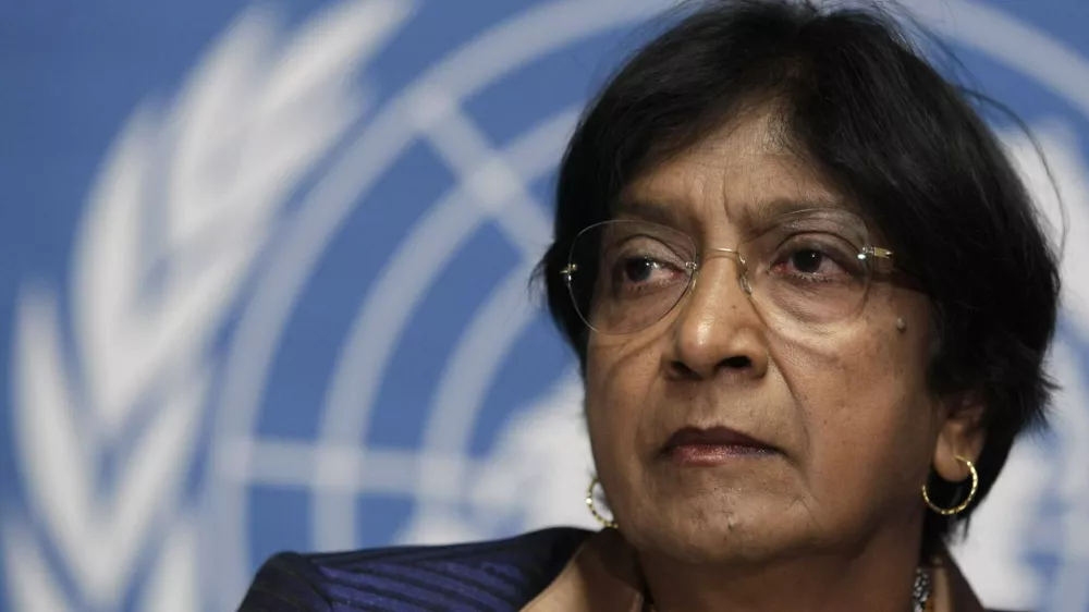 U.N. High Commissioner for Human Rights Navi Pillay looks on during a news conference at the United Nations European headquarters in Geneva December 1, 2011. REUTERS/Denis Balibouse (SWITZERLAND - Tags: POLITICS)