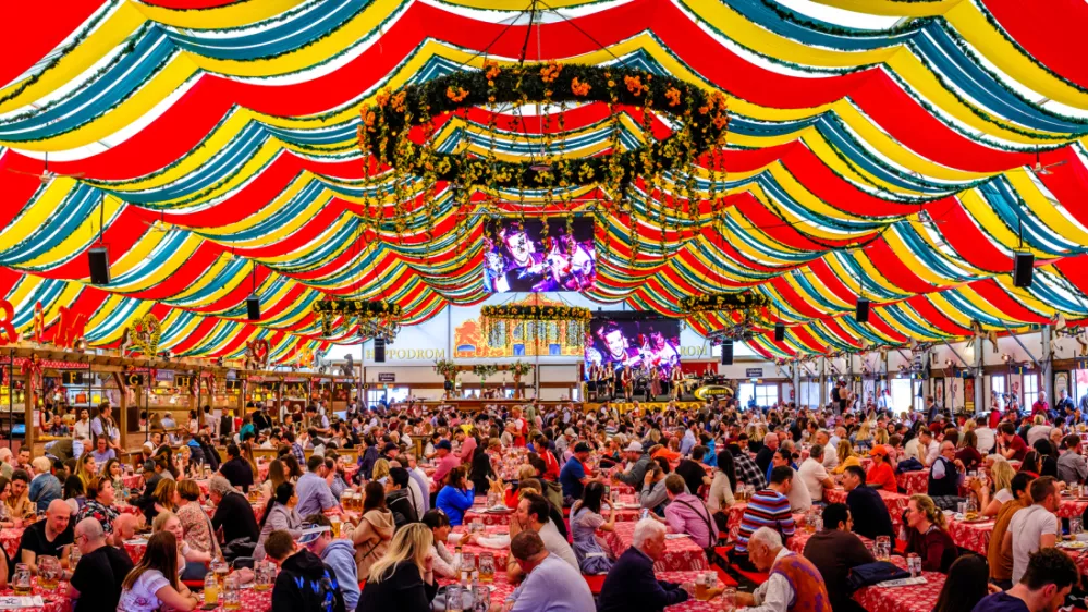 Munich, Germany - April 23: typical bavarian beertent with guests and decoration at the annual spring festival (Fr&uuml;hlingsfest) in Munich on April 23, 2023