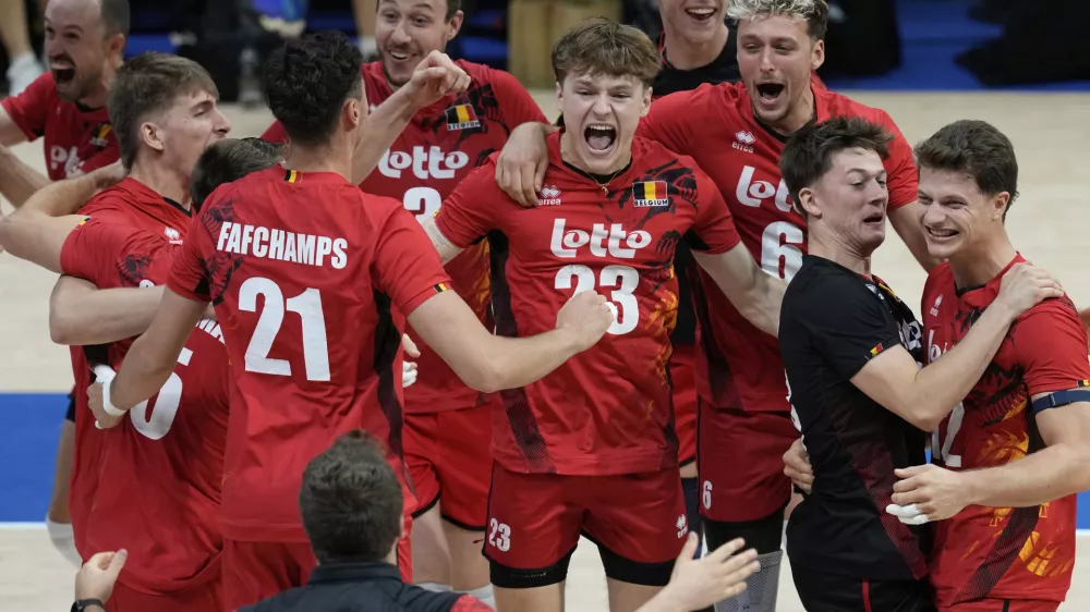 Belgium team celebrates after winning against Italy during their pool phase match at the 2025 FIVB Volleyball Men's World Championship in Quezon city, Philippines on Tuesday, Sept. 16, 2025. (AP Photo/Aaron Favila)