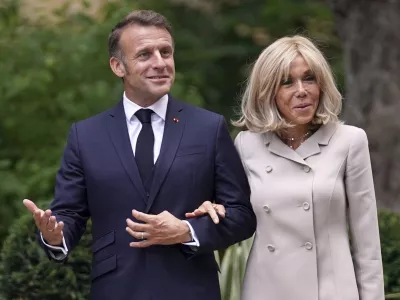 FILE - French President Emmanuel Macron and wife Brigitte arrive at 10 Downing Street in London, Wednesday, July 9, 2025.(AP Photo/Alberto Pezzali, Pool, File)