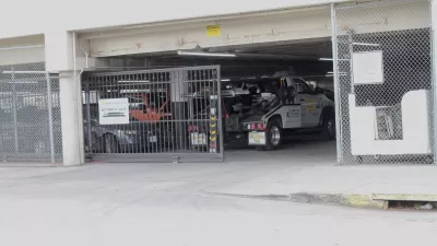 Hollywood towing yard where a rotting body found inside impounded Tesla registered to singer D4vd, Los Angeles police say.09 Sep 2025Pictured: d4vd impounded Tesla where body was found - Hollywood Tow.,Image: 1035583144, License: Rights-managed, Restrictions: World Rights, Model Release: no