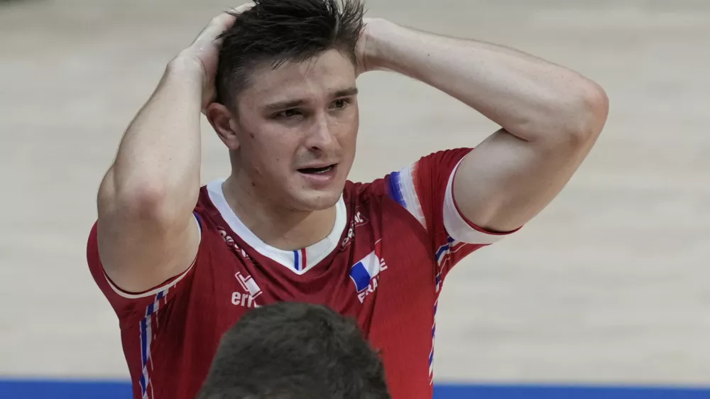 Theo Faure of France reacts after losing to Argentina during their pool phase match at the 2025 FIVB Volleyball Men's World Championship in Quezon city, Philippines on Thursday, Sept. 18, 2025. (AP Photo/Aaron Favila)