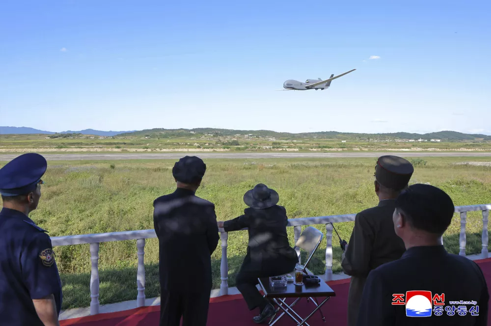 This photo provided by the North Korean government, shows North Korean leader Kim Jong Un inspects a test of a drone at an undisclosed place in North Korea Thursday, Sept. 18, 2025. Independent journalists were not given access to cover the event depicted in this image distributed by the North Korean government. The content of this image is as provided and cannot be independently verified. Korean language watermark on image as provided by source reads: "KCNA" which is the abbreviation for Korean Central News Agency. (Korean Central News Agency/Korea News Service via AP)