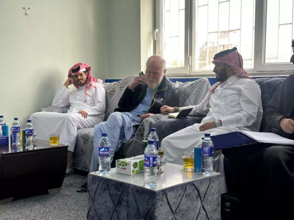British citizen Peter Reynolds, who had been in custody in Afghanistan, sits among Qatari diplomats, in Kabul, Afghanistan, in undated photo. Qatar Government/Handout via REUTERS  THIS IMAGE HAS BEEN SUPPLIED BY A THIRD PARTY NO RESALES. NO ARCHIVES