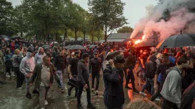 20 September 2025, Netherlands, The Hague: Protestors light flares during a far-right demonstration in The Hague, against immigration, asylum seekers, and violence in the country. Photo: James Petermeier/ZUMA Press Wire/dpa