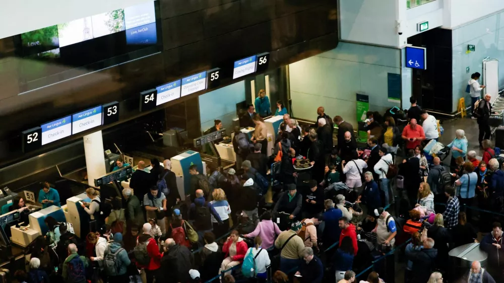 People queue inside Terminal 2 at Dublin Airport, following its reopening after it was evacuated as a safety precaution, in Dublin, Ireland, September 20, 2025. REUTERS/Clodagh Kilcoyne
