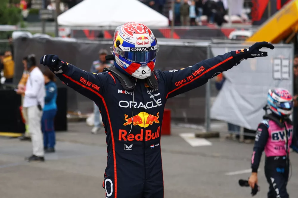 Formula One F1 - Azerbaijan Grand Prix - Baku City Circuit, Baku, Azerbaijan - September 21, 2025 Red Bull's Max Verstappen celebrates winning the Azerbaijan Grand Prix REUTERS/Lisi Niesner