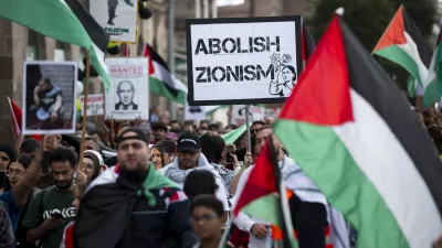 FILED - 13 September 2025, Bavaria, Nuremberg: "Abolish Zionism" is written on a sign held at a pro-Palestine demonstration by an alliance of "Palestine solidarity" organizations under the motto "Rise4Gaza". Photo: Daniel Vogl/dpa