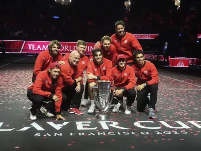 Team World players celebrate after defeating Team Europe on the third day to win the Laver Cup tennis tournament in San Francisco, Sunday, Sept. 21, 2025. (AP Photo/Jeff Chiu)