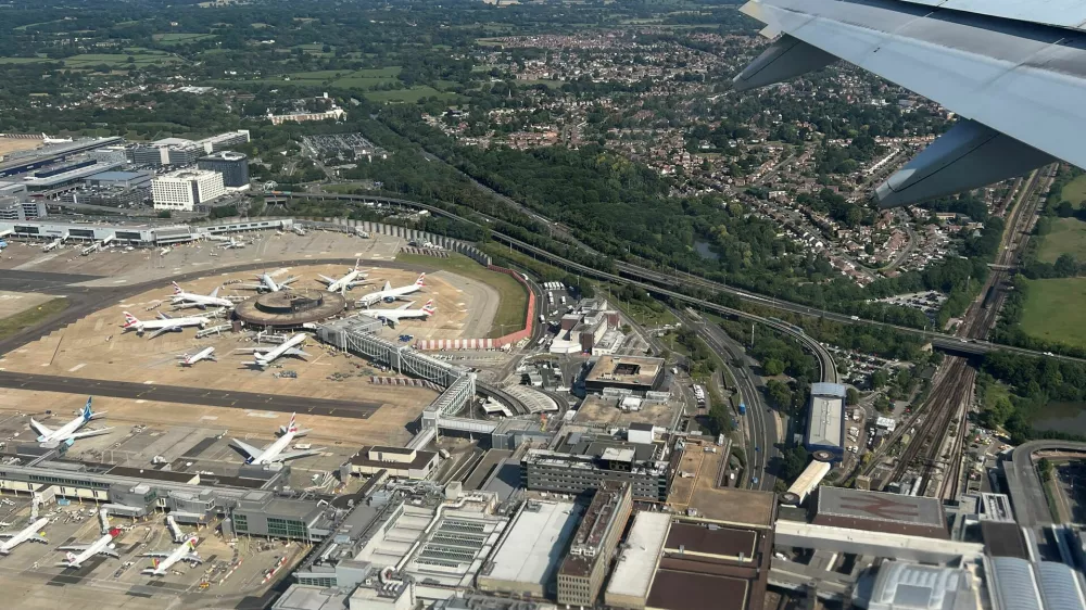 An aerial view of London Gatwick Airport, with roads and railway lines leading to it, as viewed from a Vueling passenger plane, near Crawley, Britain, August 15, 2025. The British government, on September 21, approved plans for a second runway at the airport. REUTERS/Toby Melville