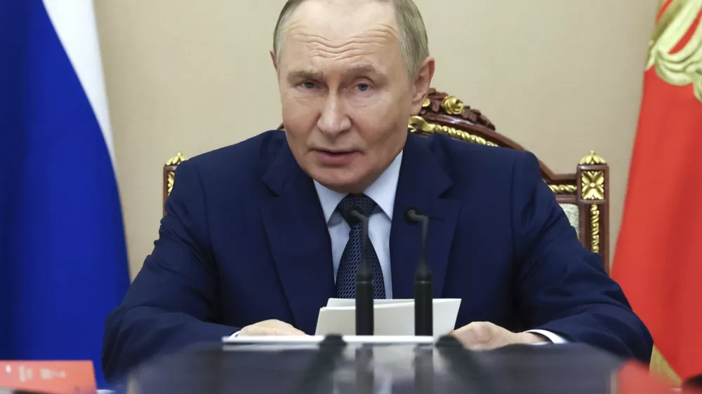 Russian President Vladimir Putin chairs a Security Council meeting at the Kremlin in Moscow, Russia, Monday, Sept. 22, 2025. (Alexander Kazakov, Sputnik, Kremlin Pool Photo via AP)