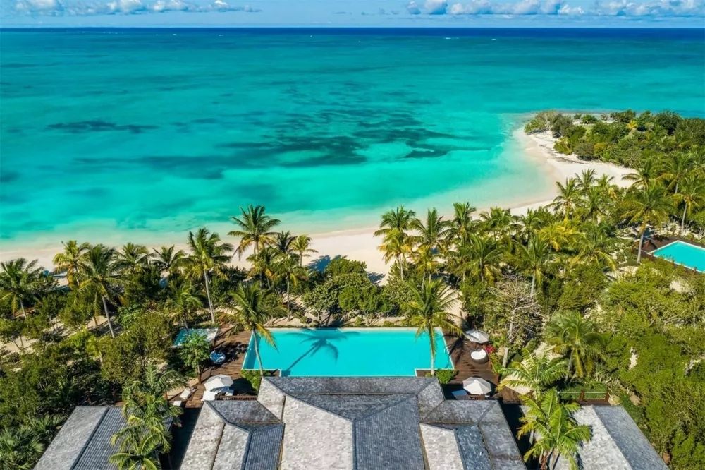 2-8-2019Bruce Willis has sold his home on the Turks and Caicos' Parrot Cay island for $27 Million after originally listing it for $33 million. Sitting on 7.37 acres of land, there are 18,000 square feet of living space, with 11 bedrooms and 13 bathrooms in total. Special features include a yoga pavilion, beach cabanas, children's playground and beach volleyball. Bruce Willis bought the property in 2000 and even got married there. Pictured: Bruce Willis's house,Image: 423403956, License: Rights-managed, Restrictions:, Model Release: no