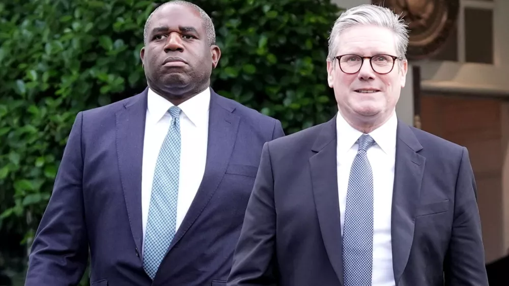 Britain's PM Keir Starmer and Foreign Secretary David Lammy, leave the White House in Washington DC following a meeting with US President Joe Biden. Picture date: Friday September 13, 2024. Stefan Rousseau/Pool via REUTERS
