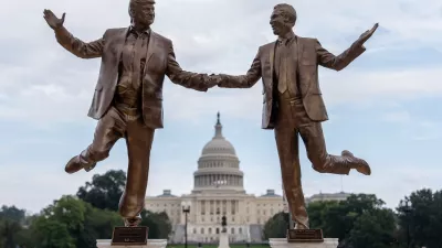 A work of protest art representing President Donald Trump and Jeffrey Epstein is seen on the National Mall near the Capitol, Tuesday, Sept. 23, 2025, in Washington. (AP Photo/Julia Demaree Nikhinson)