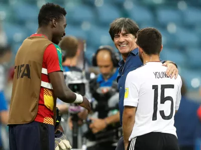Soccer Football - Germany v Cameroon - FIFA Confederations Cup Russia 2017 - Group B - Fisht Stadium, Sochi, Russia - June 25, 2017  Germany coach Joachim Low and Amin Younes celebrate after the match  REUTERS/Carl Recine